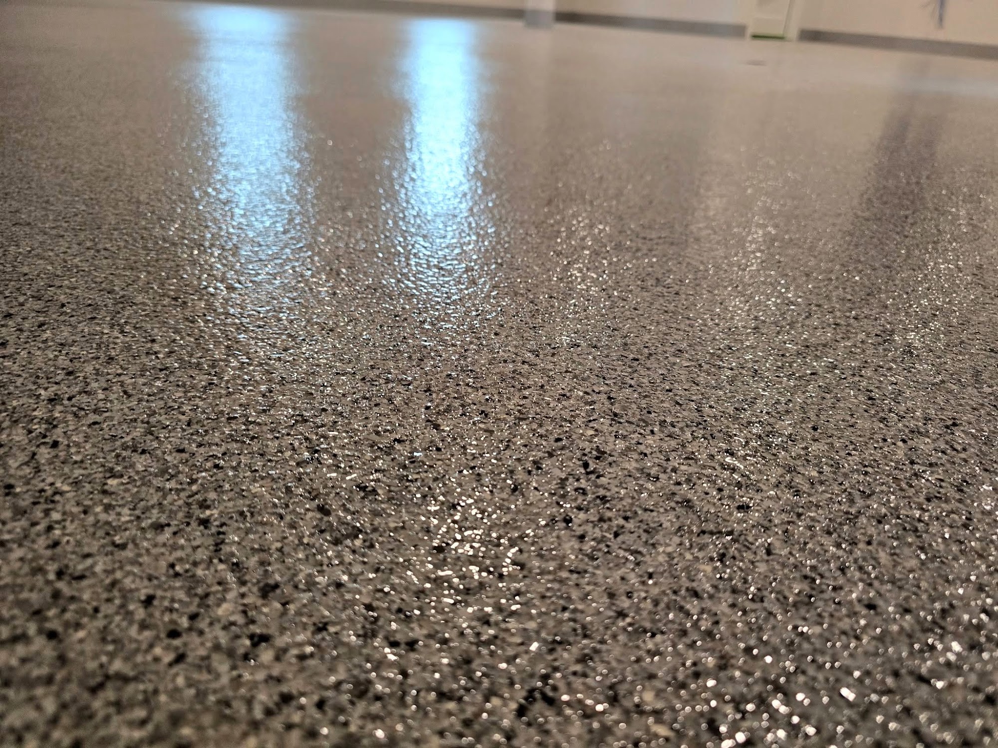 Close-up of a gray flake floor