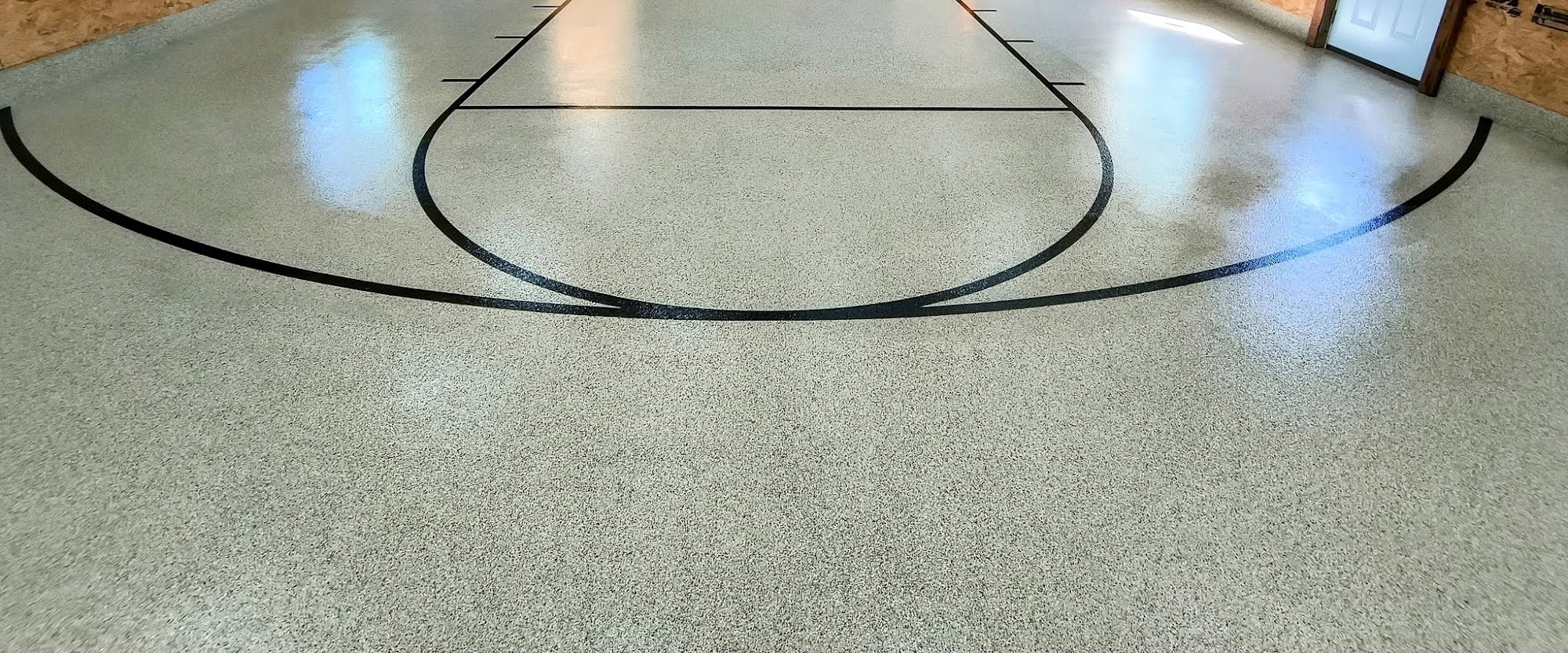 Cream flake floor with black court lines